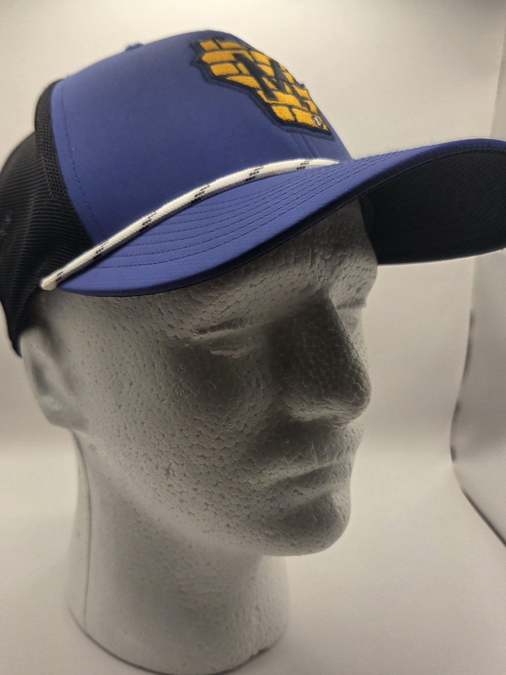 Milwaukee Brewers baseball cap with a distinctive Wisconsin-shaped brick logo